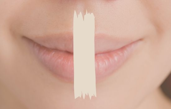 Closed lips with a tape vertically on it to stay closede during sleep.